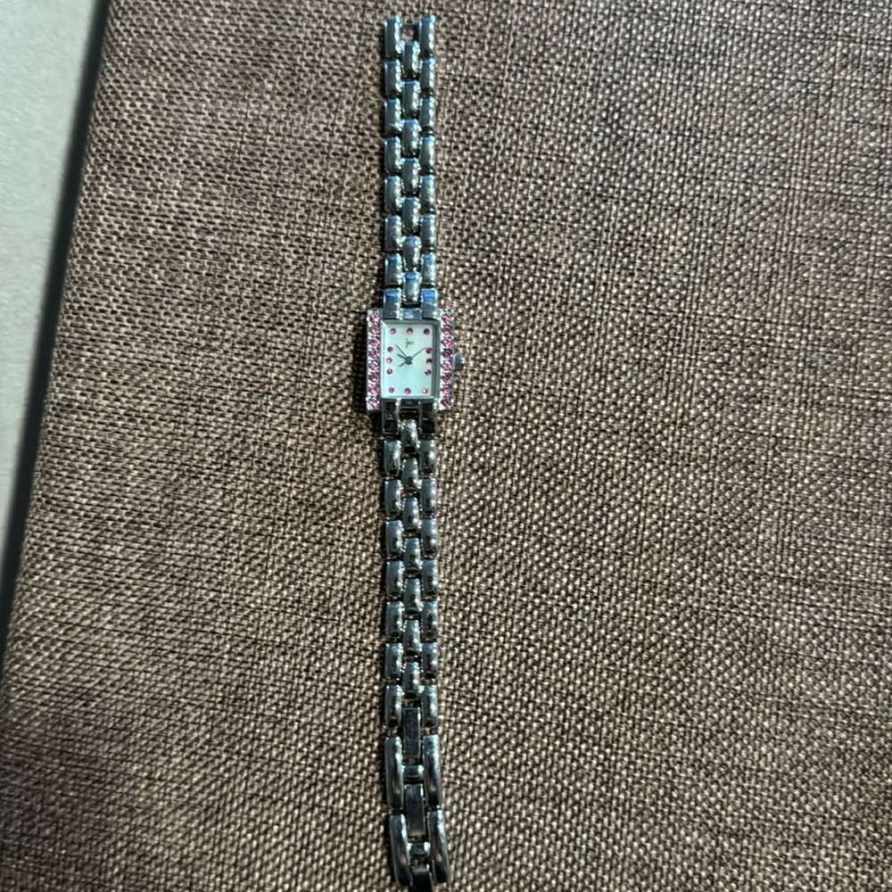 Jaz stainless steel women’s watch with pink accents